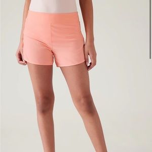 athletes orange shorts